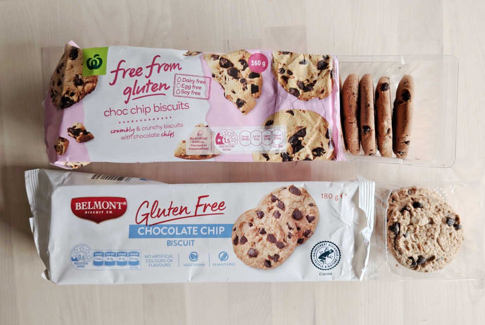 Packets of Belmont and Woolworths GF Choc Chip Biscuits.